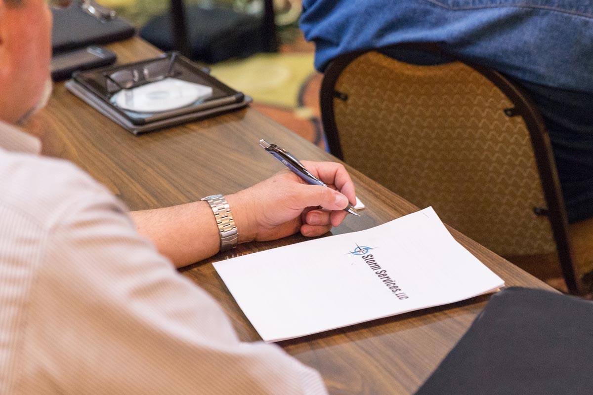 Meeting with clients to plan for storm responses.